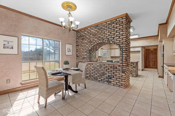 a front view of a house with large windows