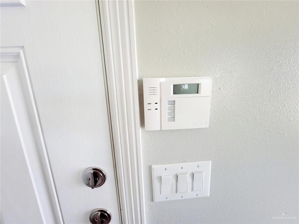1904 Davenport Street, Unit 1 Weslaco, TX 78596 - Photo 10 of 20 a bathroom with a sink and a mirror
