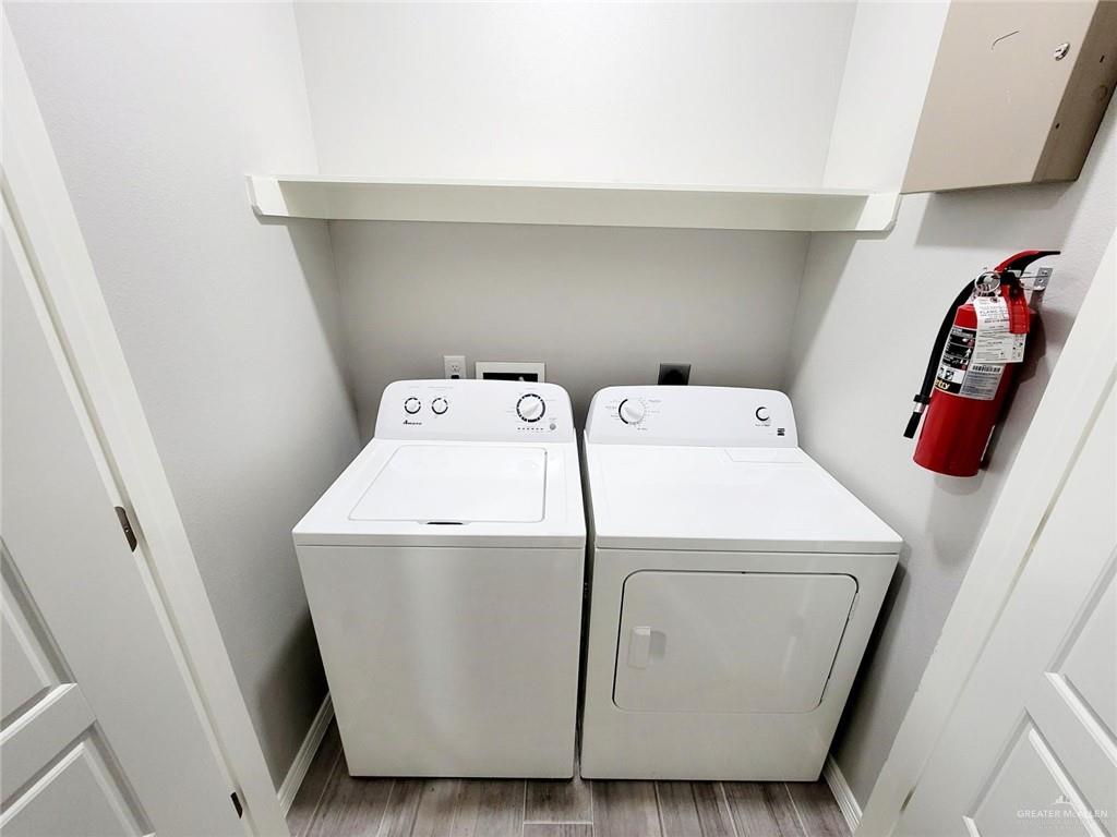 1904 Davenport Street, Unit 1 Weslaco, TX 78596 - Photo 15 of 20 a utility room with dryer and washer
