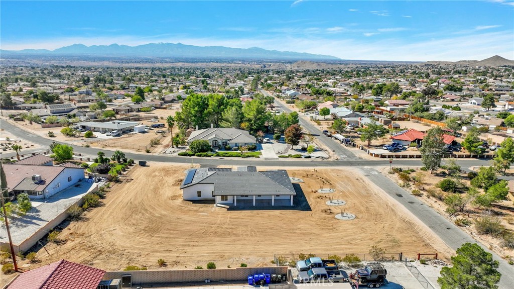 16339 Rimrock Road Apple Valley, CA 92307 - Photo 45 of 50 an aerial view of residential houses with outdoor space