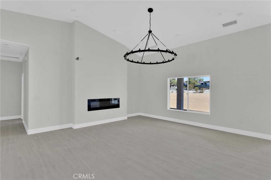 16339 Rimrock Road Apple Valley, CA 92307 - Photo 9 of 50 a view of a room with window and a ceiling fan