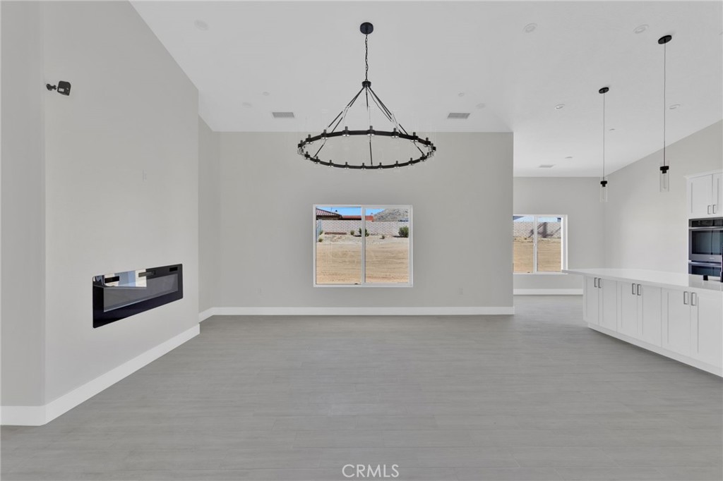 16339 Rimrock Road Apple Valley, CA 92307 - Photo 10 of 50 a view of a room with furniture and window