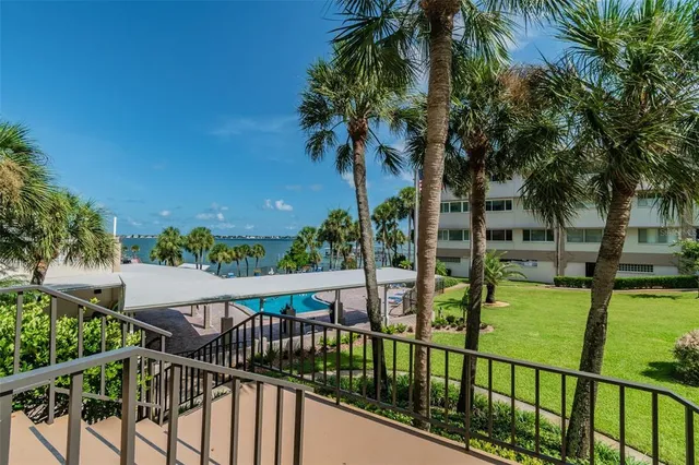 a view of a balcony with an ocean view
