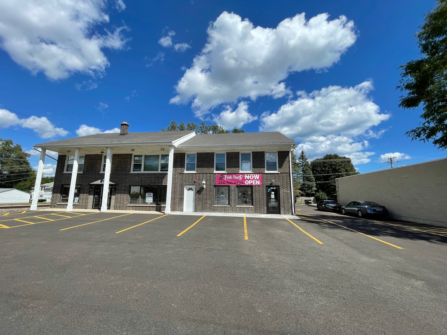 a view of a cafe with sitting area