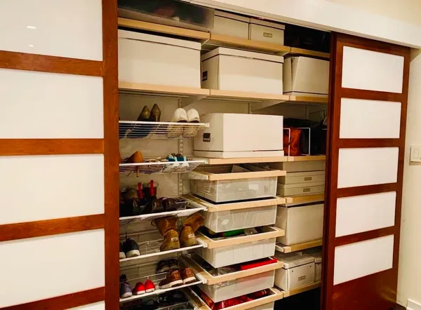 a refrigerator with wooden floor