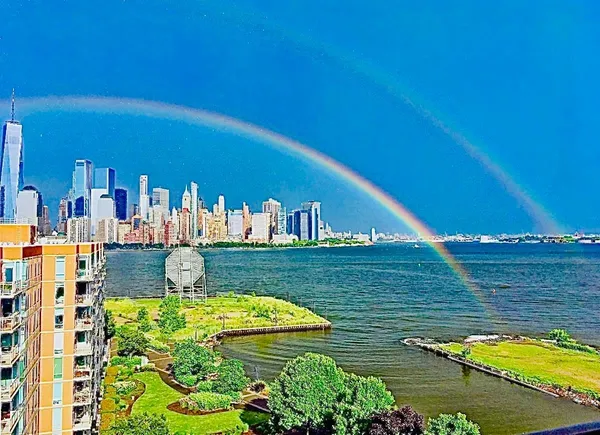 a view of swimming pool with outdoor seating and yard