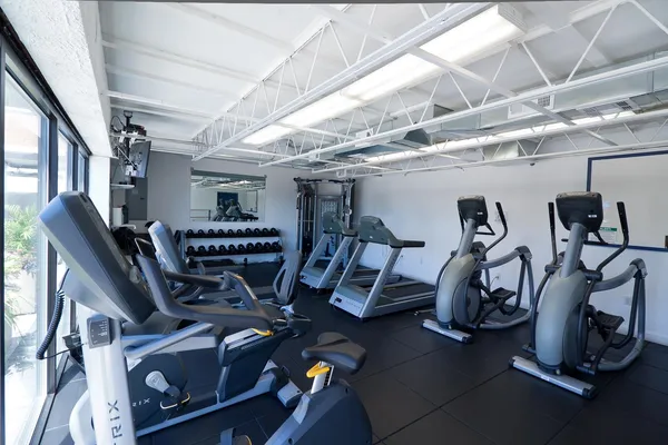 a view of a room with gym equipment