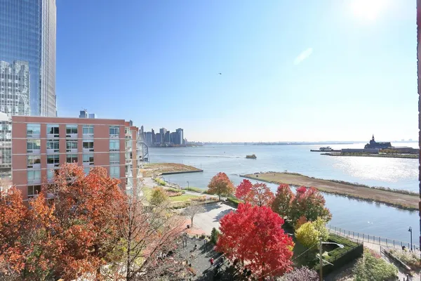 a view of a lake with a building in front of it