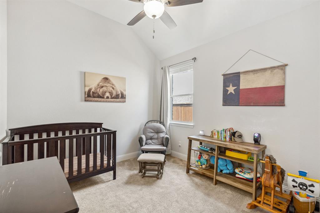 482 Prairie View Drive Haslet, TX 76052 - Photo 15 of 33 a bedroom with furniture and a window