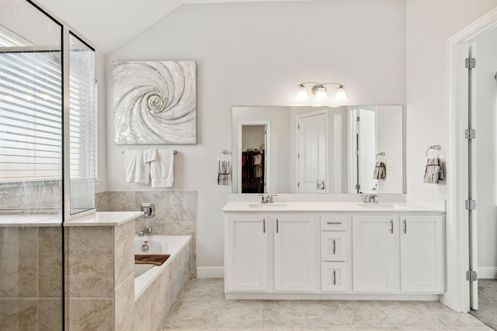 482 Prairie View Drive Haslet, TX 76052 - Photo 21 of 33 a bathroom with a sink and a mirror