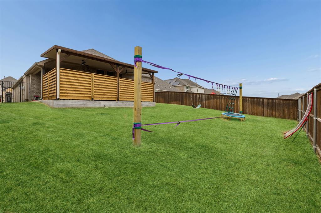 482 Prairie View Drive Haslet, TX 76052 - Photo 26 of 33 a view of a backyard