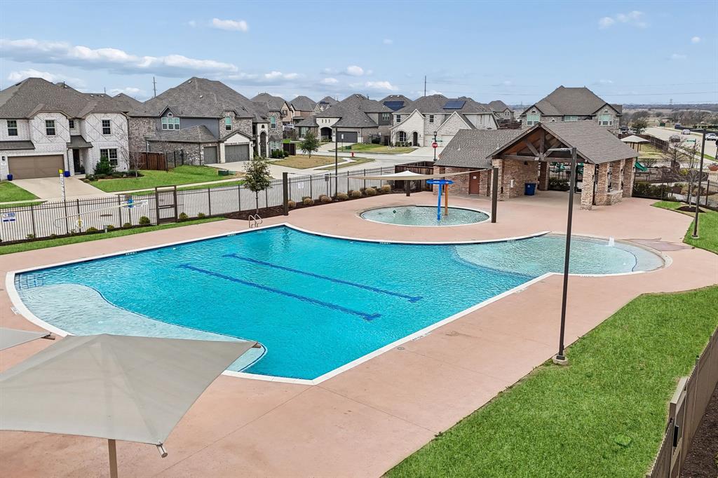 482 Prairie View Drive Haslet, TX 76052 - Photo 32 of 33 a view of a house with a yard