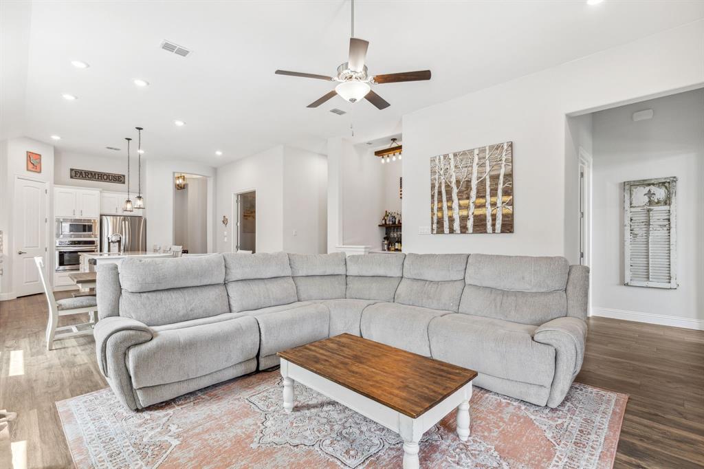 482 Prairie View Drive Haslet, TX 76052 - Photo 4 of 33 a living room with furniture and a table