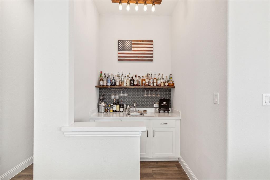 482 Prairie View Drive Haslet, TX 76052 - Photo 5 of 33 a room with a sink and a mirror