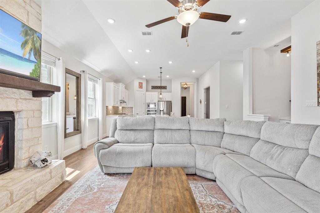 482 Prairie View Drive Haslet, TX 76052 - Photo 6 of 33 a living room with furniture and a fireplace