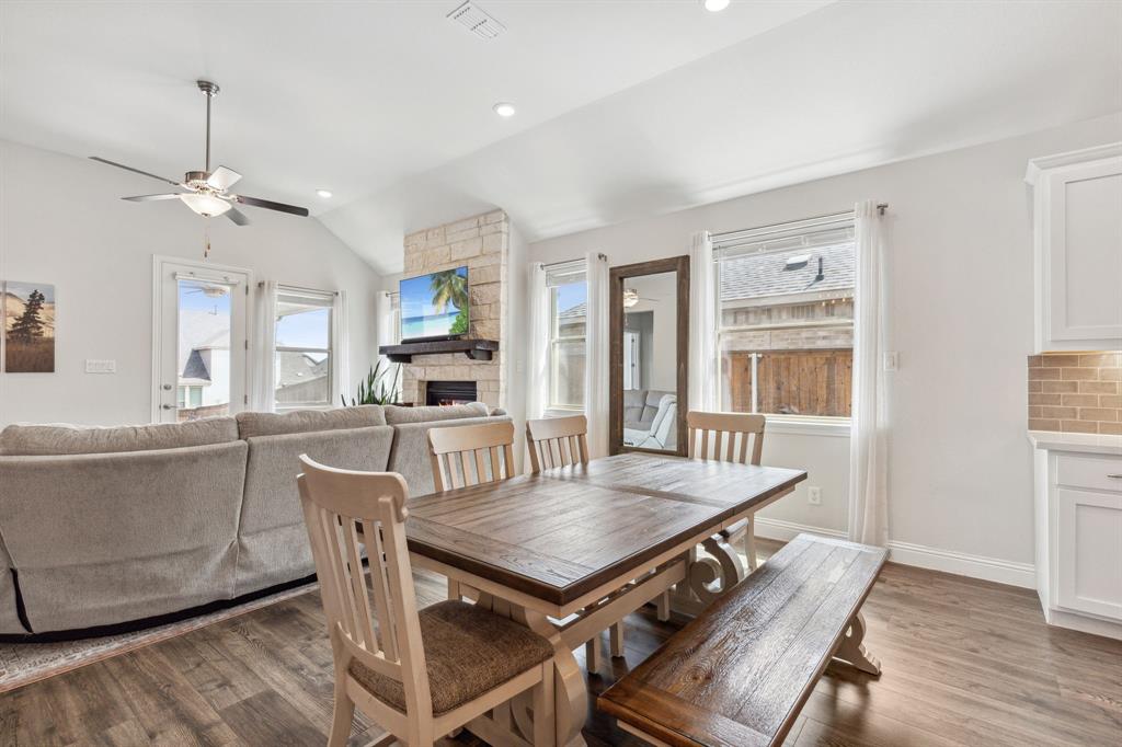 482 Prairie View Drive Haslet, TX 76052 - Photo 10 of 33 a view of a dining room with furniture window and wooden floor
