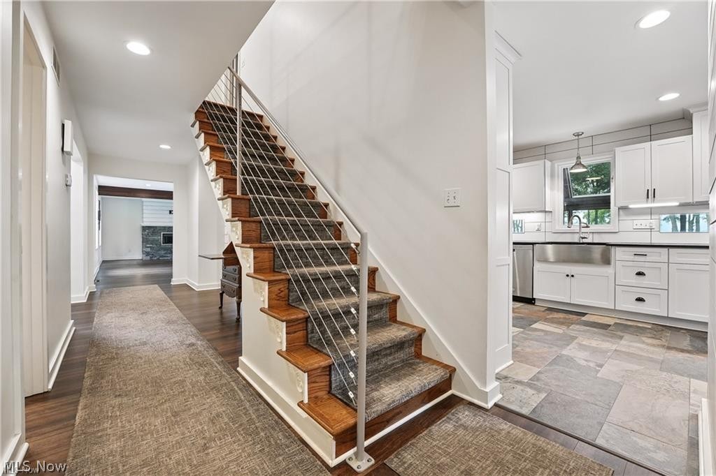 263 East Pine Lake Road North Lima, OH 44452 - Photo 13 of 50 Stairs with recessed lighting and wood finished floors