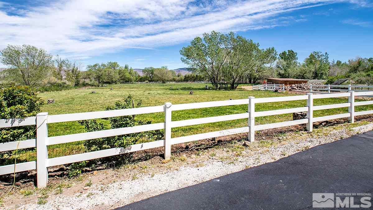 11500 Thomas Creek Road Reno, NV 89511 - Photo 19 of 24 a view of a yard with wooden fence