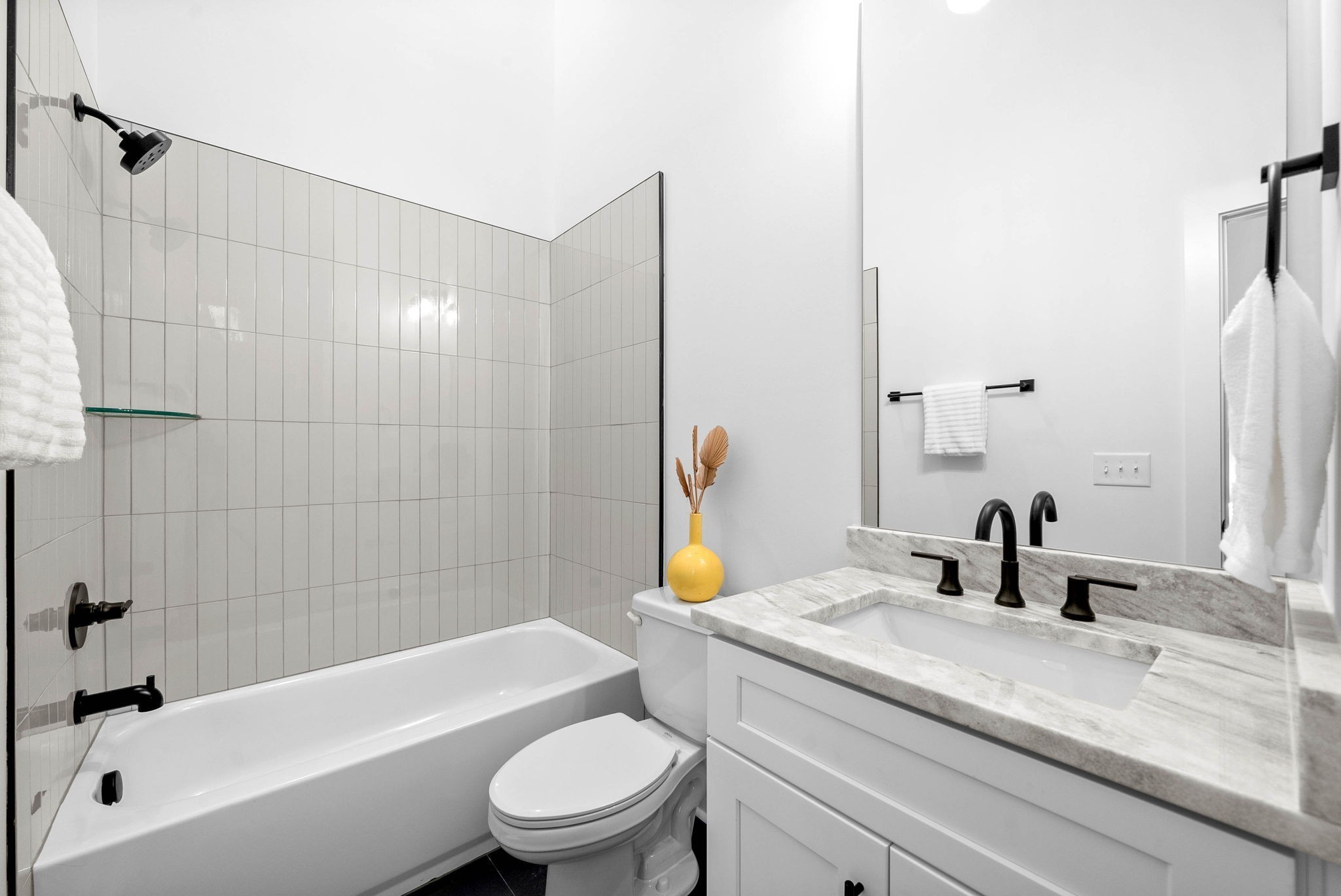 684 Anderson Lane Madison, TN 37115 - Photo 21 of 33 a bathroom with a granite countertop sink toilet and shower