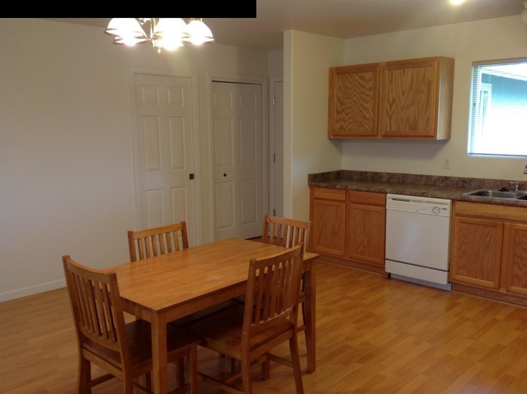 2750 Kokomo Road Haiku, HI 96708 - Photo 15 of 30 a view of a dining room with furniture