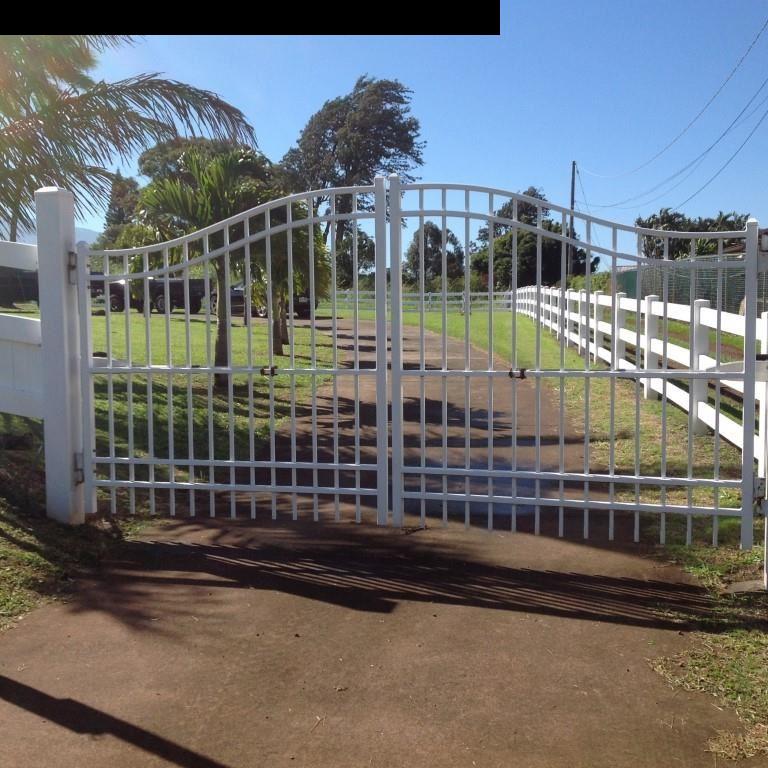 2750 Kokomo Road Haiku, HI 96708 - Photo 2 of 30 a view of a balcony with a iron fence