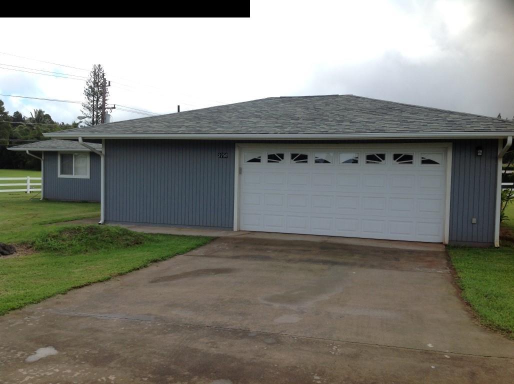 2750 Kokomo Road Haiku, HI 96708 - Photo 30 of 30 a front view of a house with garden