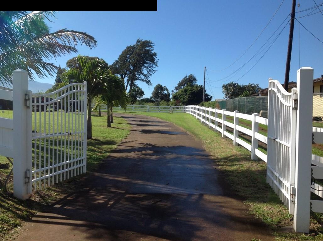 2750 Kokomo Road Haiku, HI 96708 - Photo 3 of 30 a view of a house with a yard