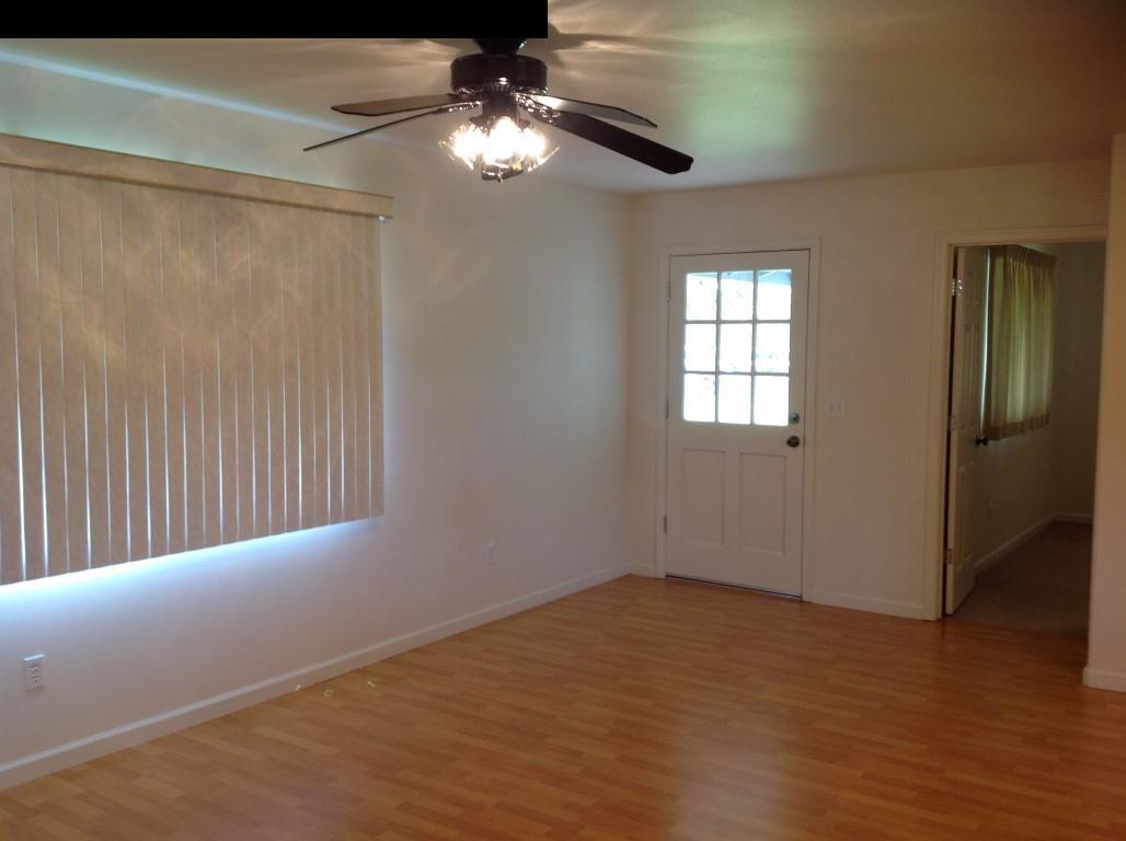 2750 Kokomo Road Haiku, HI 96708 - Photo 6 of 30 a view of an empty room with a window