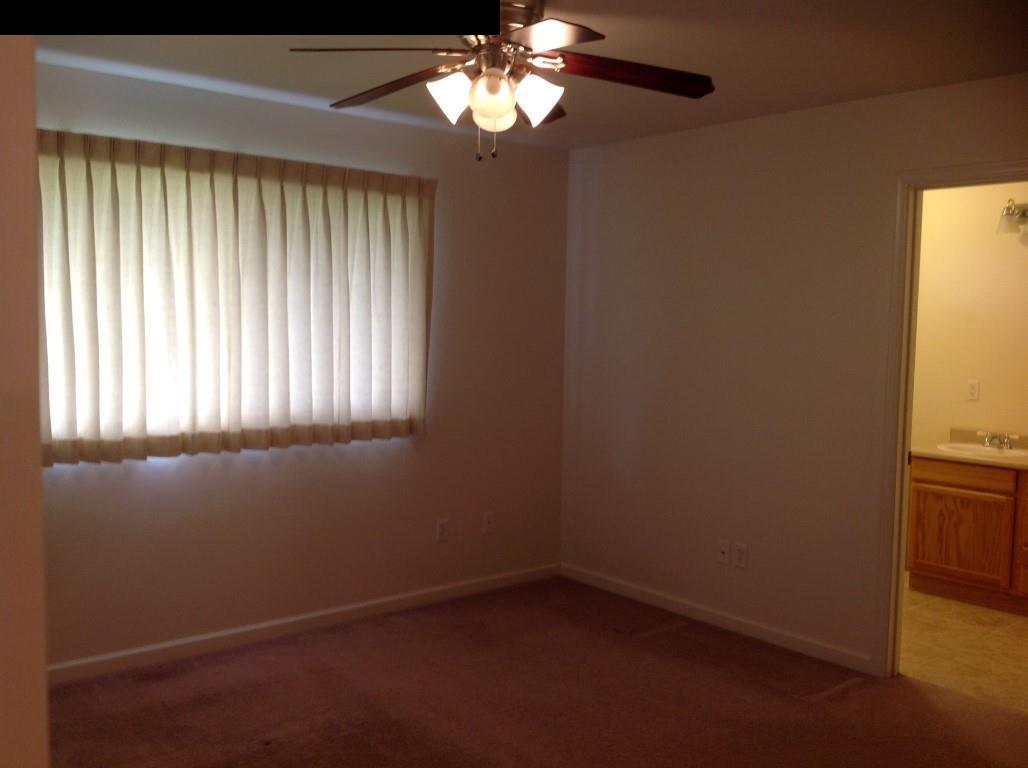 2750 Kokomo Road Haiku, HI 96708 - Photo 7 of 30 an empty room with a window