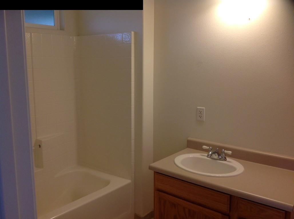 2750 Kokomo Road Haiku, HI 96708 - Photo 9 of 30 a bathroom with a sink and a bathtub