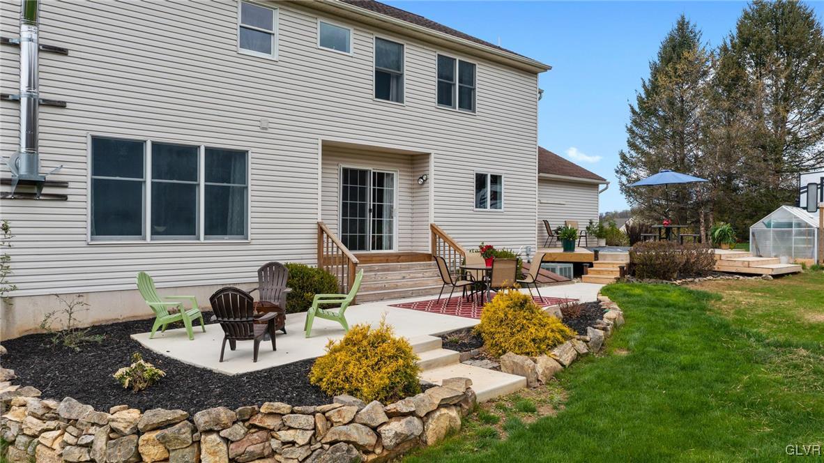 180 West Butternut Road Hellertown, PA 18055 - Photo 15 of 50 a view of a house with backyard and sitting area