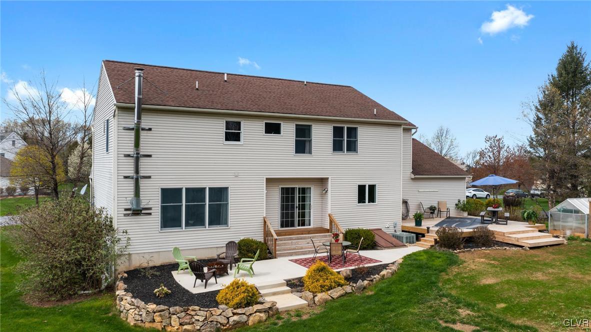 180 West Butternut Road Hellertown, PA 18055 - Photo 16 of 50 a front view of a house with garden