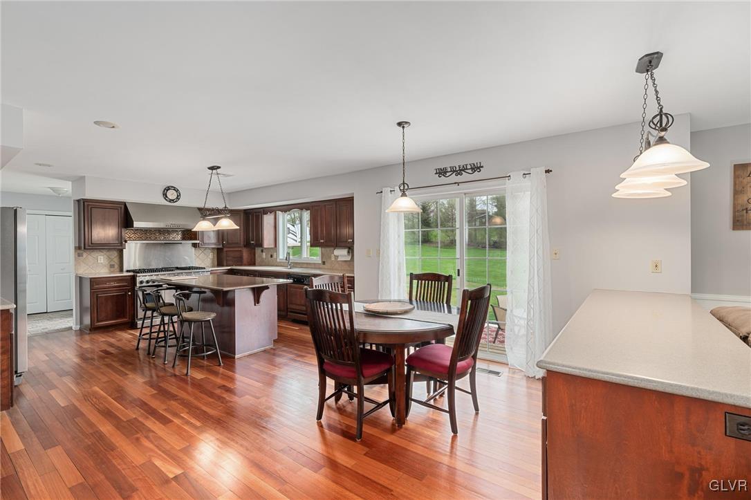 180 West Butternut Road Hellertown, PA 18055 - Photo 18 of 50 a view of a dining room with furniture window and wooden floor
