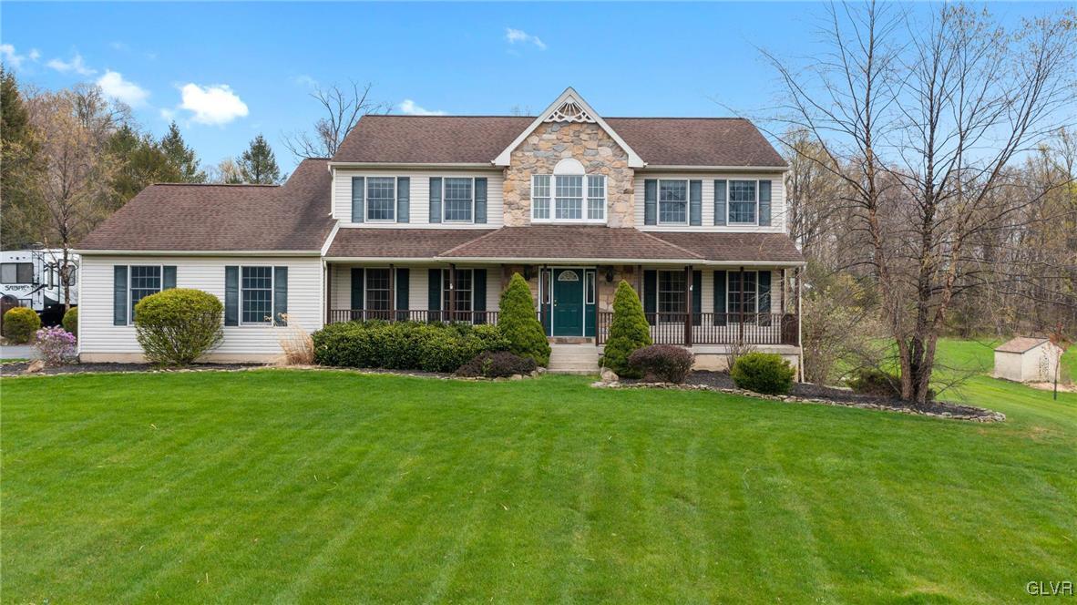180 West Butternut Road Hellertown, PA 18055 - Photo 2 of 50 a front view of a house with a yard