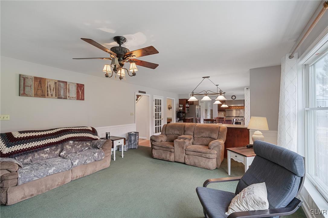 180 West Butternut Road Hellertown, PA 18055 - Photo 27 of 50 a bedroom with furniture and a chandelier