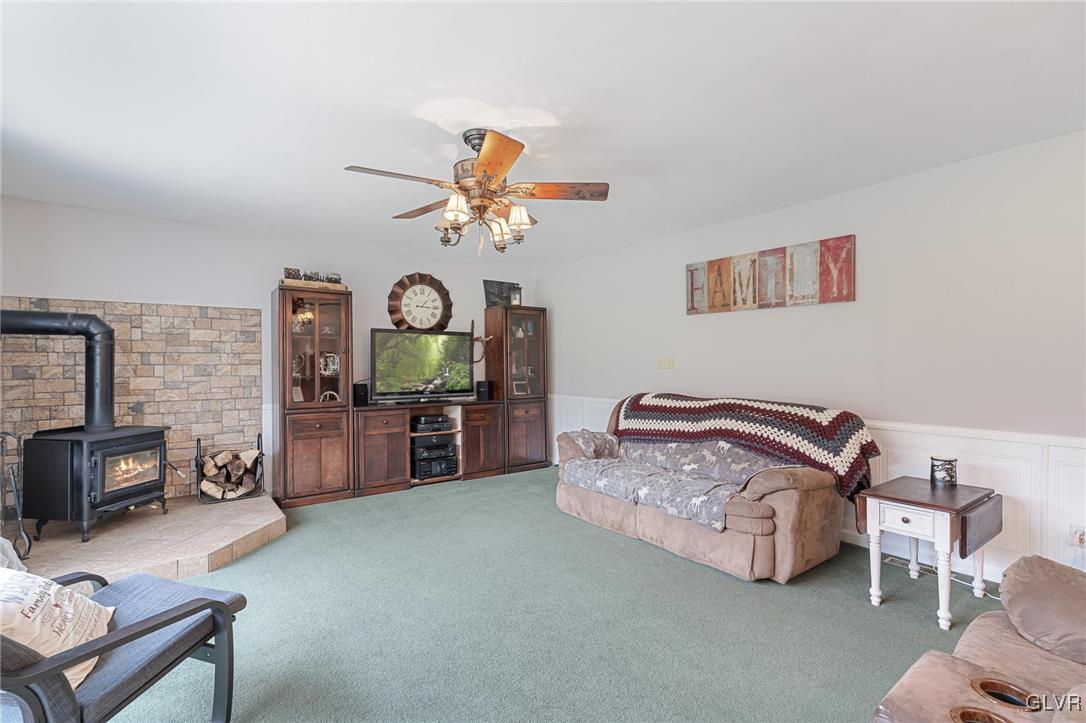 180 West Butternut Road Hellertown, PA 18055 - Photo 29 of 50 a living room with furniture and a flat screen tv