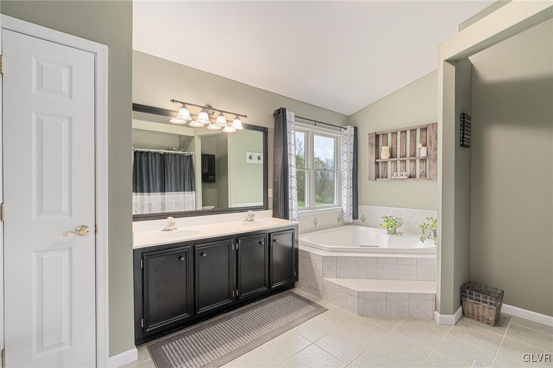 180 West Butternut Road Hellertown, PA 18055 - Photo 38 of 50 a bathroom with a tub sink shower and mirror