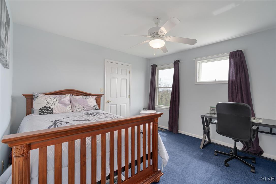 180 West Butternut Road Hellertown, PA 18055 - Photo 41 of 50 a bedroom with a bed chair and a window