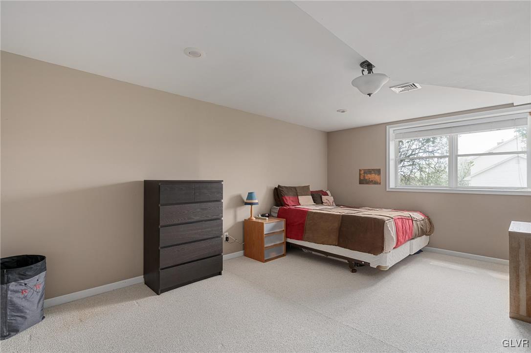 180 West Butternut Road Hellertown, PA 18055 - Photo 46 of 50 a bedroom with a bed and a window