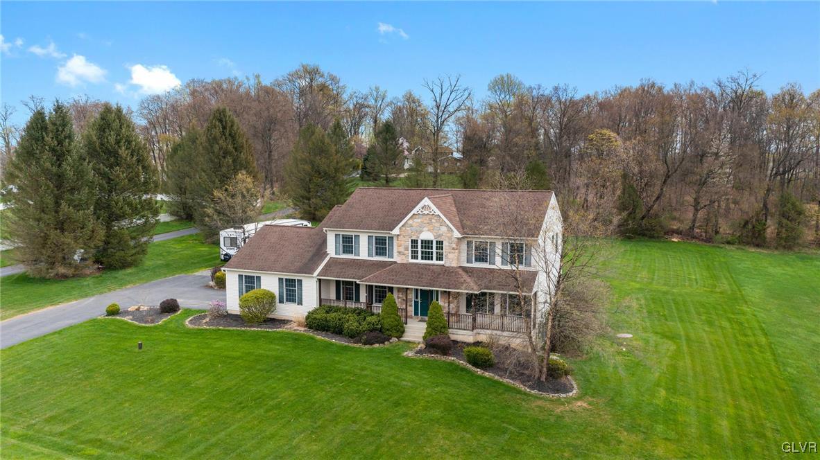 180 West Butternut Road Hellertown, PA 18055 - Photo 6 of 50 a front view of a house with garden