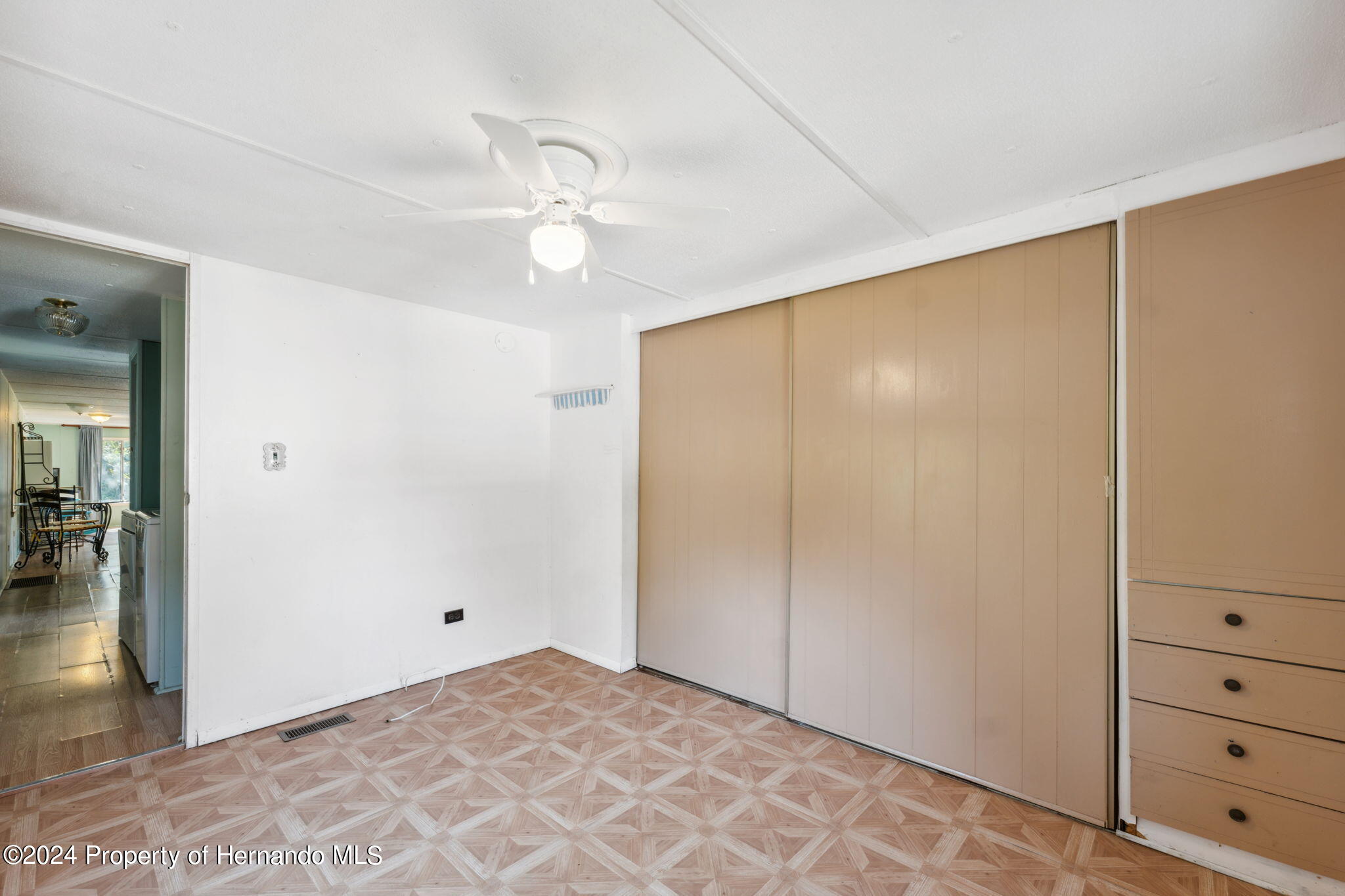 10327 East Victory Lane Inverness, FL 34450 - Photo 16 of 35 wooden floor in an empty room
