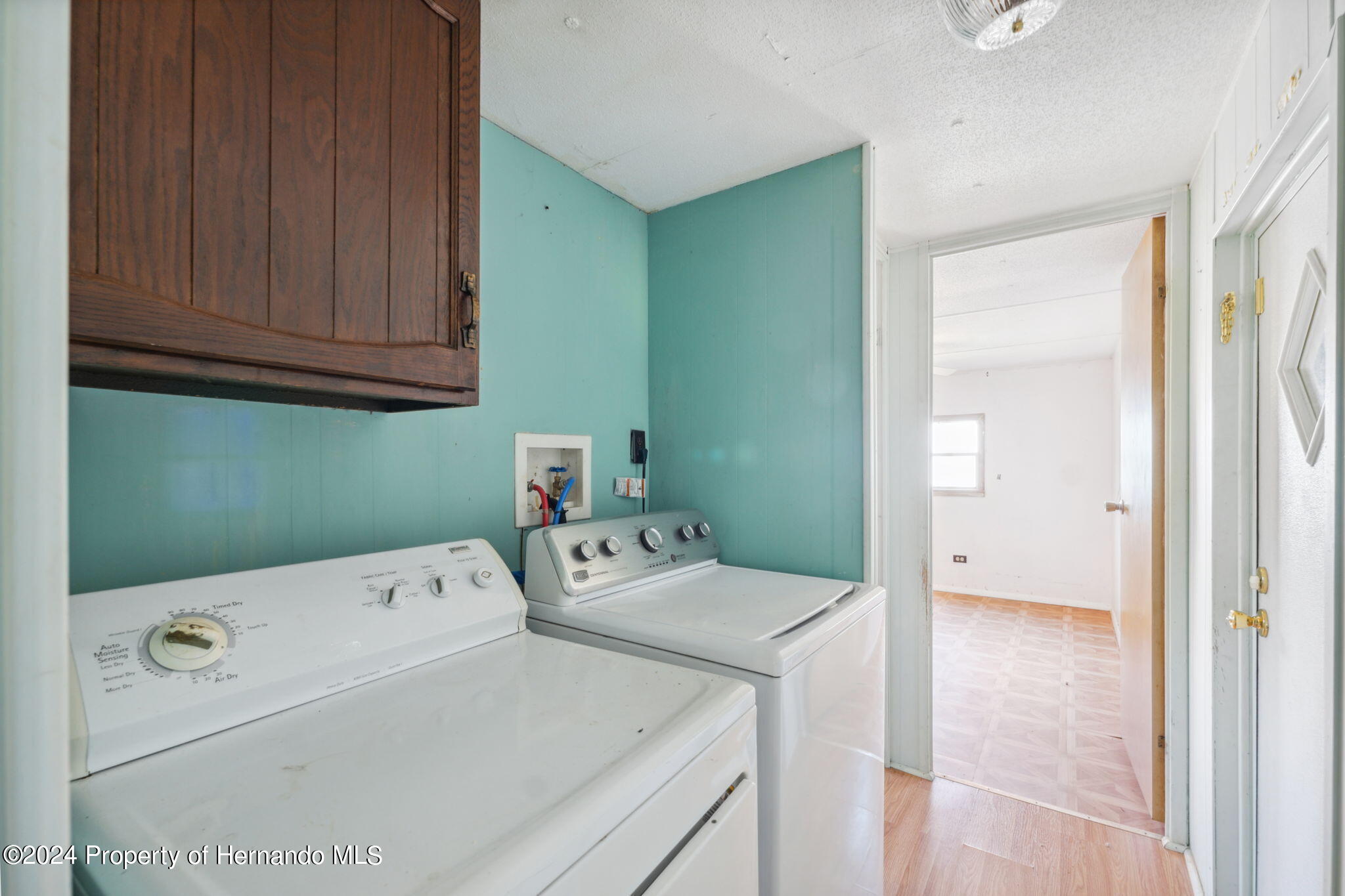 10327 East Victory Lane Inverness, FL 34450 - Photo 20 of 35 a utility room with dryer and washer