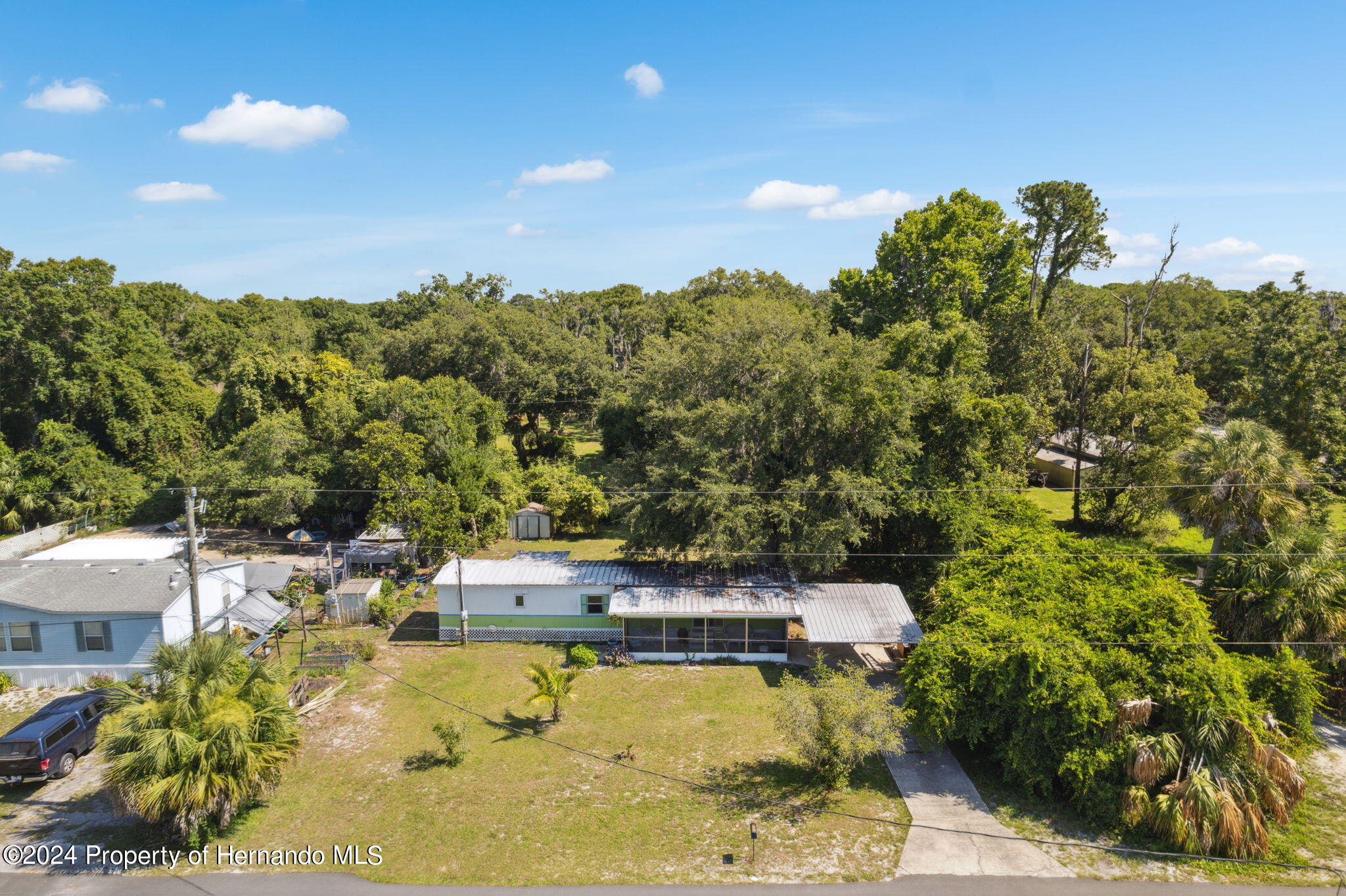10327 East Victory Lane Inverness, FL 34450 - Photo 2 of 35 a view of a swimming pool with an ocean view