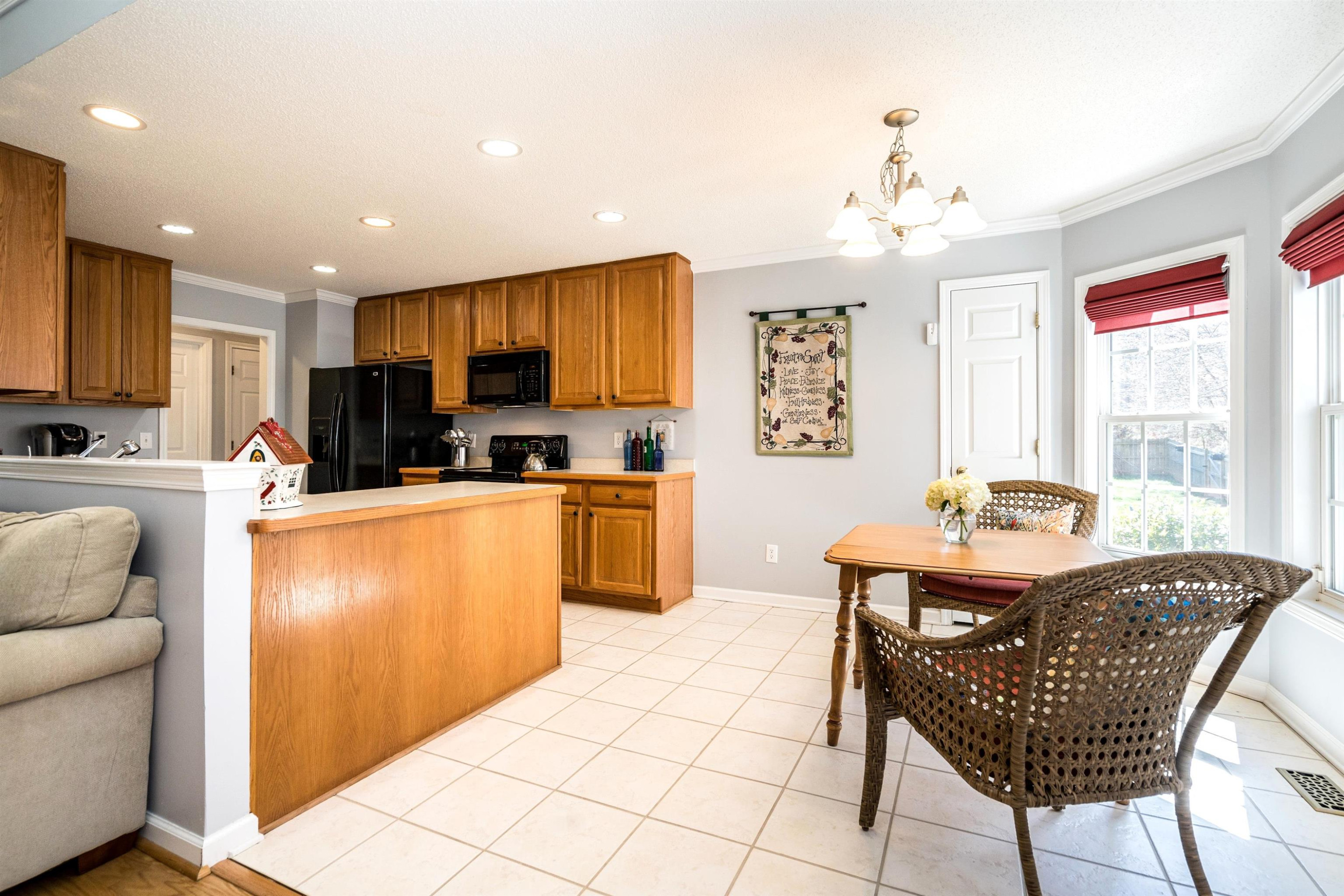180 Mickleson Ridge Drive Raleigh, NC 27603 - Photo 10 of 32 Open and Bright Breakfast Area