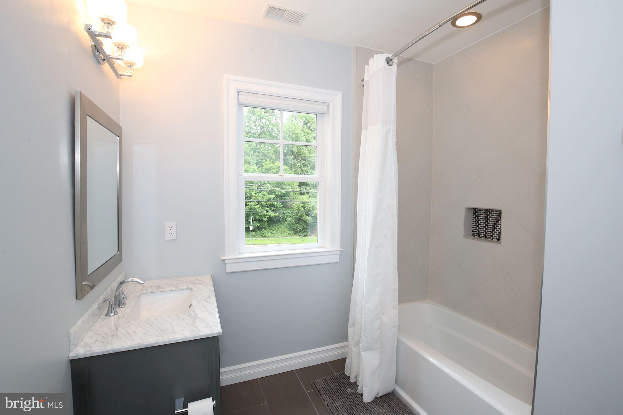 3346 Jones Bridge Road Chevy Chase, MD 20815 - Photo 19 of 50 Upstairs Guest Bedroom Suite Bathroom