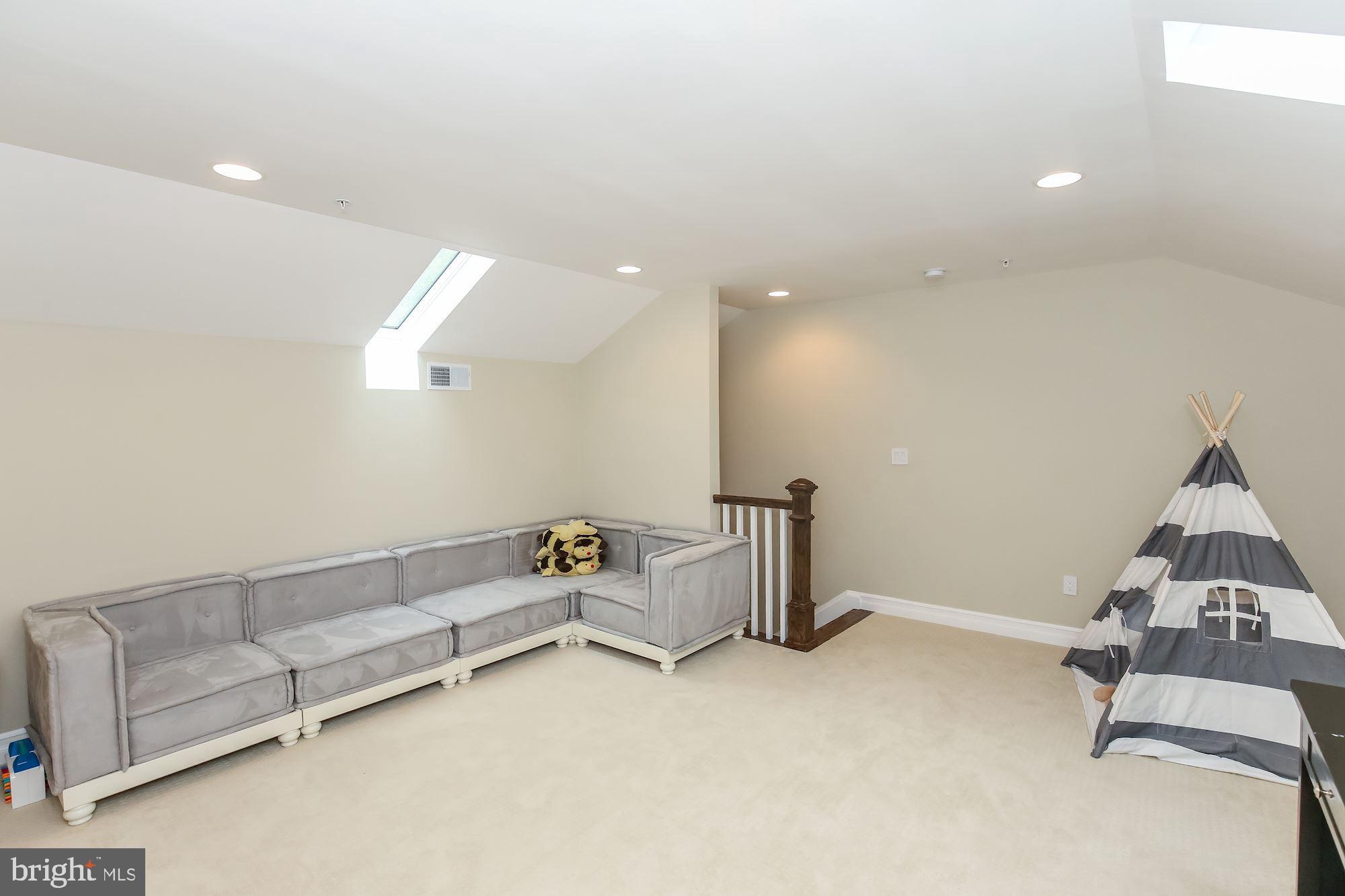 3346 Jones Bridge Road Chevy Chase, MD 20815 - Photo 23 of 50 Attic Recreation Room