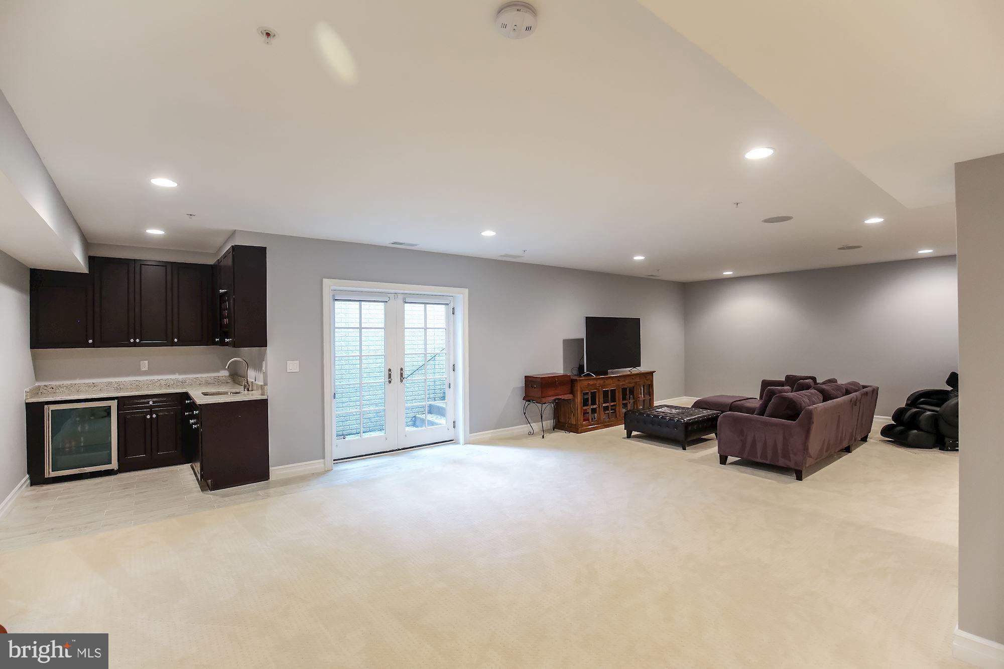 3346 Jones Bridge Road Chevy Chase, MD 20815 - Photo 26 of 50 Lower Level Recreation Room