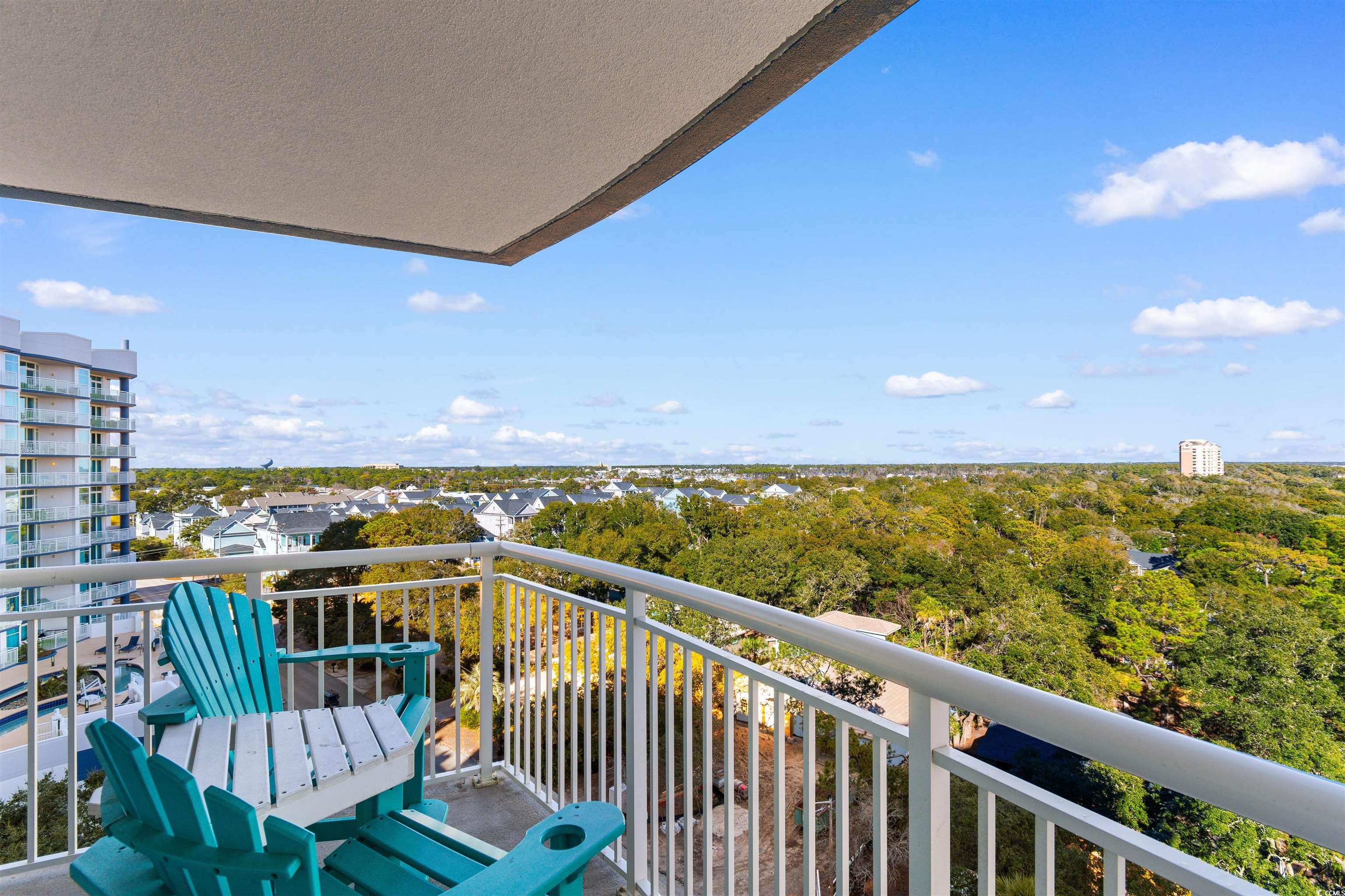 215 77th Avenue North, Unit 603 Myrtle Beach, SC 29572 - Photo 35 of 37 Balcony with view of wooded area