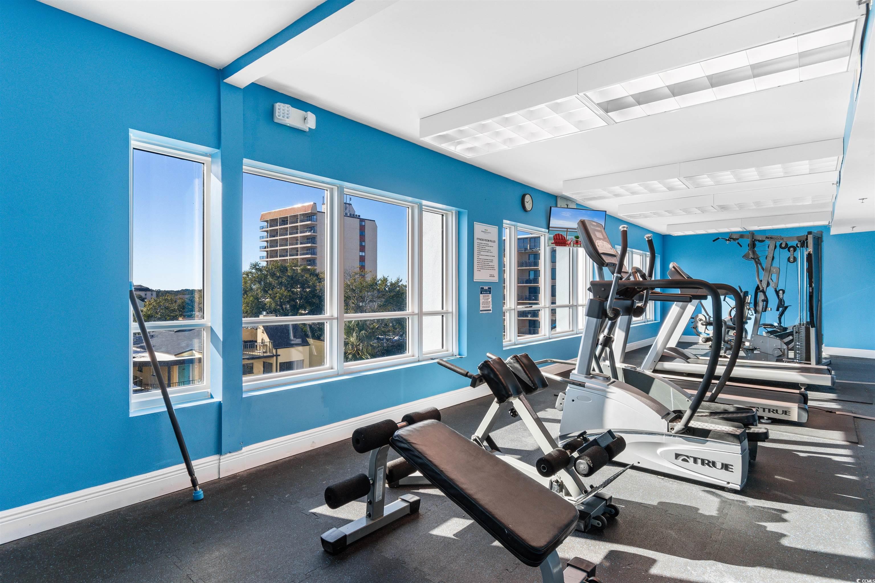 215 77th Avenue North, Unit 603 Myrtle Beach, SC 29572 - Photo 4 of 37 Exercise room with baseboards