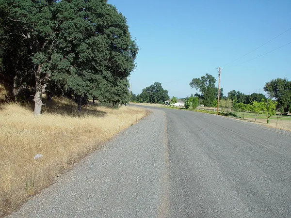 a view of a road near a yard